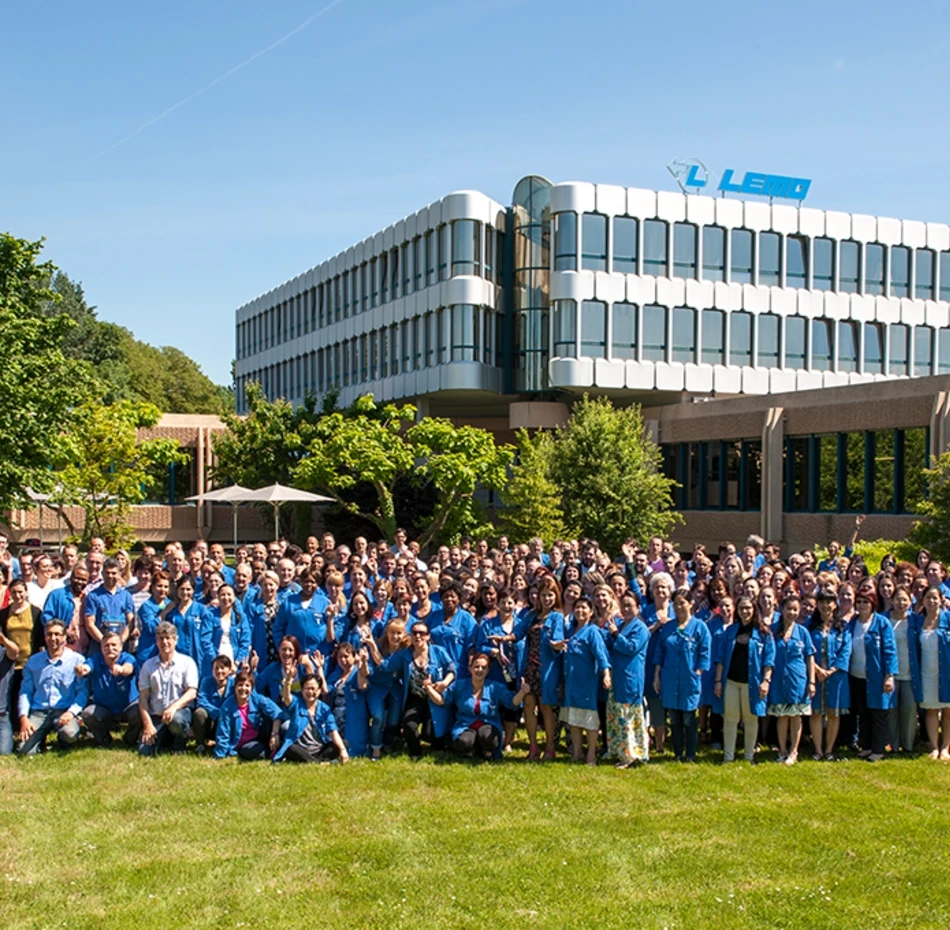 staff in front of factory